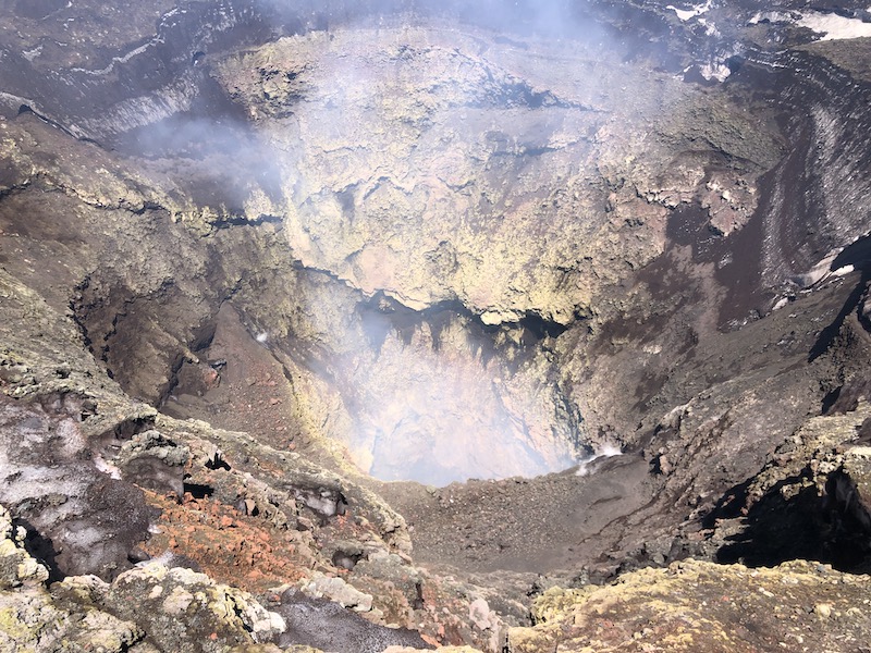 Sulfur spewing from the volcano crater